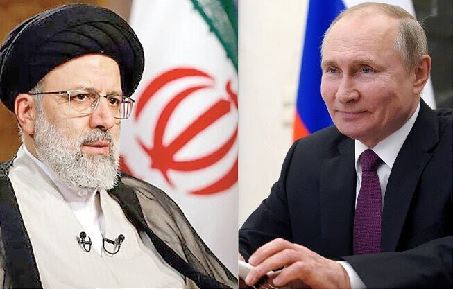 Tổng thống Nga Vladimir Putin (phải) sẽ tiếp người đồng cấp Iran Ebrahim Raisi vào ngày 19/1. (Nguồn: ifpnews) Điện Kremlin công bố thời điểm diễn ra hội đàm thượng đỉnh Nga-Iran ảnh 1