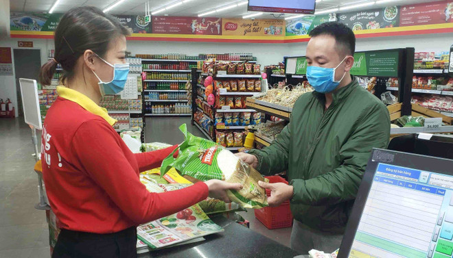 (Ảnh minh họa: Hoàng Hùng/TTXVN) CPI tháng 2 giảm nhẹ do ảnh hưởng của dịch COVID-19 ảnh 1