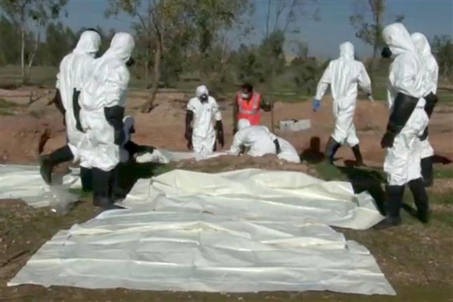 Tổ chức IS đã hành quyết hàng trăm tù nhân ở miền Đông Syria ảnh 1