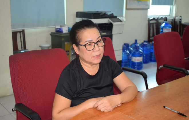 Đối tượng Nguyễn Thị Dung tại cơ quan điều tra. (Ảnh: Đinh Văn Nhiều/TTXVN) Khởi tố 4 đối tượng mua bán hóa đơn trị giá hàng nghìn tỷ đồng ảnh 1