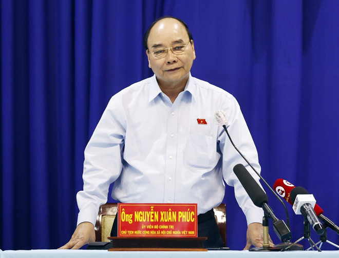 Chủ tịch nước Nguyễn Xuân Phúc phát biểu. (Ảnh: Thống Nhất/TTXVN) Chủ tịch nước tiếp xúc cử tri TP.HCM trước Kỳ họp thứ 4, Quốc hội XV ảnh 1