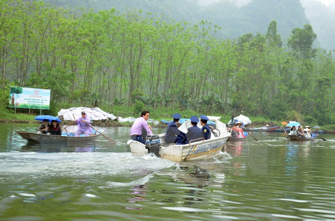 Hà Nội xử lý 21 đối tượng "cò mồi" tại di tích chùa Hương ảnh 1