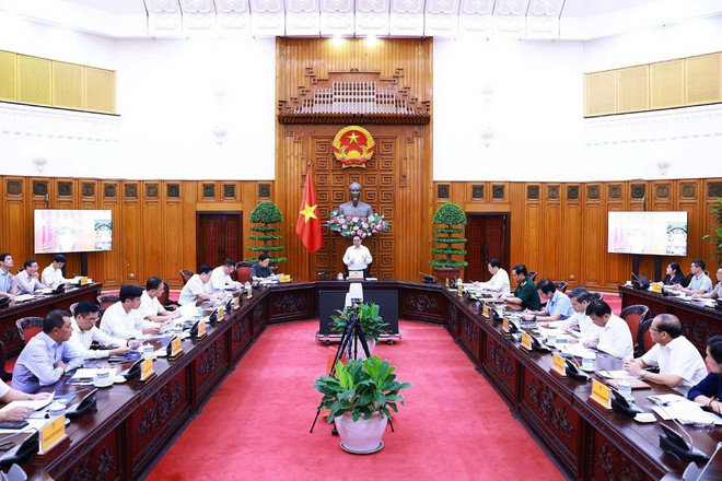 Thủ tướng Phạm Minh Chính chủ trì họp về tình hình thi công Dự án đường dây 500kV mạch 3. (Ảnh: Dương Giang/TTXVN) ttxvn_thu_tuong_du_an_duong_day_500kv_mach_3_2207-2.jpg