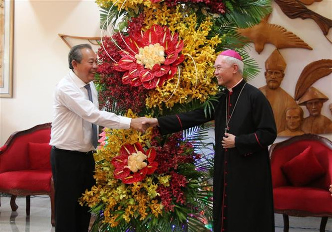 Phó Thủ tướng Trương Hòa Bình chúc Giáng sinh tại TP.HCM, Đồng Nai ảnh 1