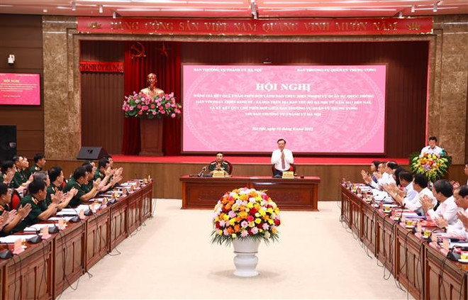 Bí thư Thành ủy Hà Nội Đinh Tiến Dũng tại Hội nghị. (Ảnh: Văn Điệp/TTXVN) Tạo môi trường ổn định để xây dựng, phát triển Thủ đô và đất nước ảnh 1
