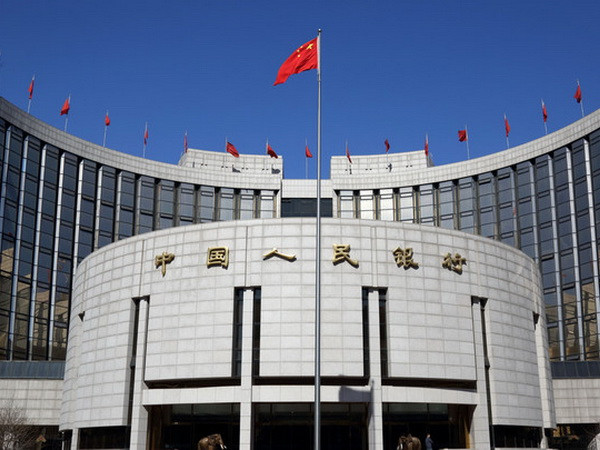 Ngân hàng nhân dân Trung Quốc. (Nguồn: AP) PBoC bơm 20 tỷ USD vào hệ thống ngân hàng trước Tết ảnh 1