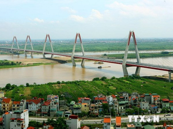Cầu Nhật Tân đã bản hoàn thành và chờ ngày thông xe đưa vào khai thác. (Ảnh: Huy Hùng/TTXVN) Cầu dây văng dài nhất vượt sông Hồng sẽ mang tên kép ảnh 1