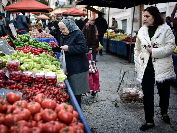 Fitch nâng xếp hạng nợ của chính phủ Hy Lạp lên một bậc ảnh 1