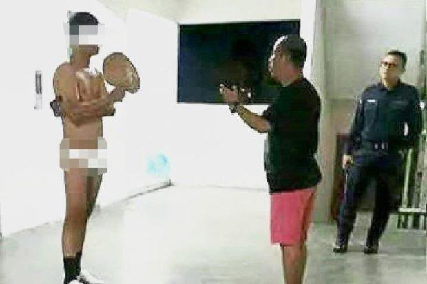 Người đàn ông khỏa thân đi dạo trong chung cư vì "nghe lời nữ thần" ảnh 1