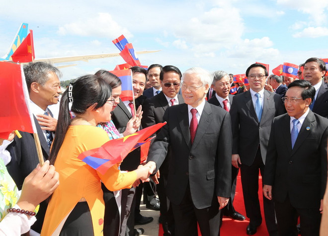 Lễ đón Tổng Bí thư Nguyễn Phú Trọng tại sân bay quốc tế Vientiane. (Ảnh: Trí Dũng/TTXVN) Tổng Bí thư Nguyễn Phú Trọng thăm hữu nghị chính thức Lào ảnh 1