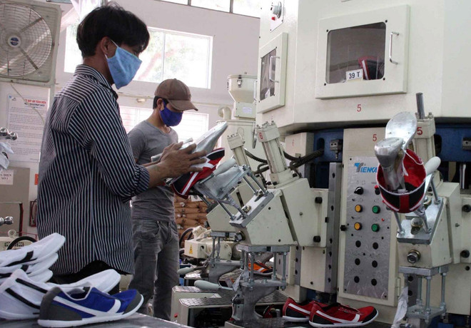 Tăng trưởng GDP của Việt nam ba năm qua đạt ở mức bình quân 5,6%. (Ảnh minh họa. Nguồn: TTXVN) GS.TS Vương Đình Huệ: Kinh tế 2014 sẽ đột phá về thể chế ảnh 1