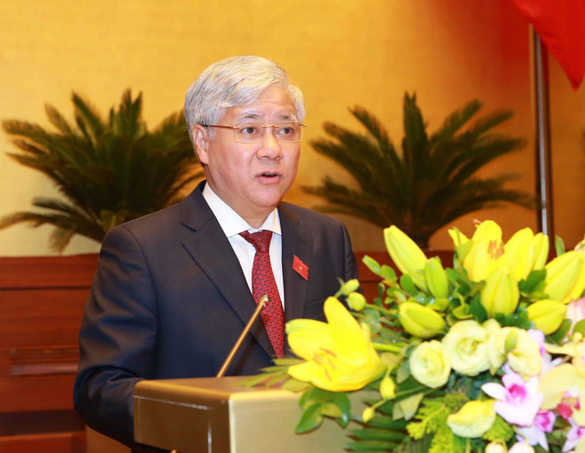 Bộ trưởng, Chủ nhiệm Ủy ban Dân tộc Đỗ Văn Chiến, thừa ủy quyền của Thủ tướng Chính phủ trình bày Đề án tổng thể phát triển kinh tế-xã hội vùng đồng bào dân tộc thiểu số và miền núi, vùng có điều kiện đặc biệt khó khăn. (Ảnh: Doãn Tấn/TTXVN) Toàn văn Thông cáo số 01 Kỳ họp thứ 8, Quốc hội khóa XIV ảnh 1
