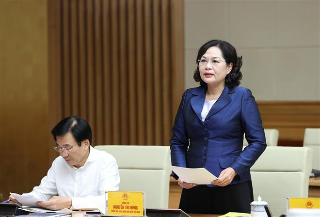 Thống đốc Ngân hàng Nhà nước Việt Nam Nguyễn Thị Hồng phát biểu. (Ảnh: Dương Giang/TTXVN) Tháo gỡ các “điểm nghẽn” để thị trường bất động sản phát triển an toàn ảnh 2