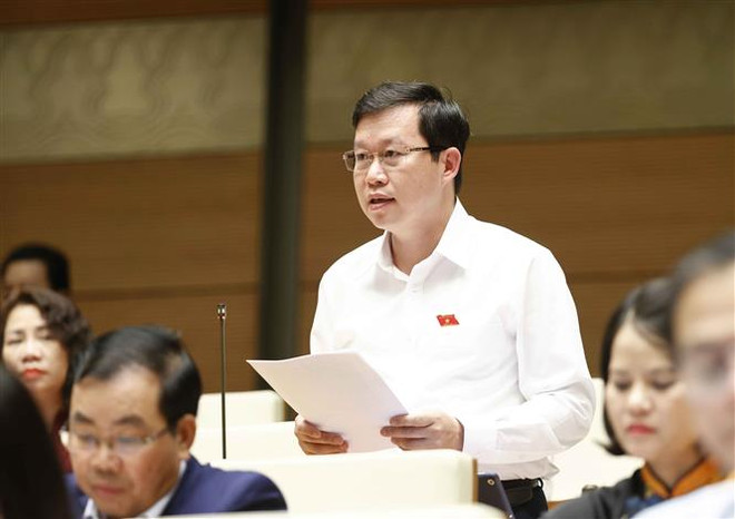 Đại biểu Quốc hội tỉnh Yên Bái Nguyễn Quốc Luận phát biểu. (Ảnh: Doãn Tấn/TTXVN) Tập trung tháo gỡ khó khăn trong thực hiện công tác quy hoạch ảnh 3