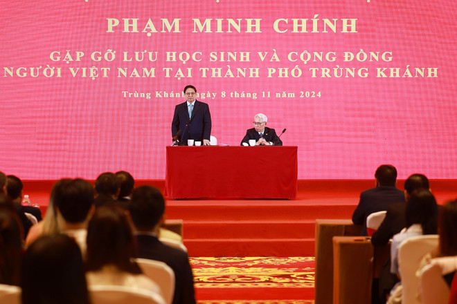 ttxvn_thu tuong pham minh chinh cong dong nguoi Viet Trung khanh (3).jpg