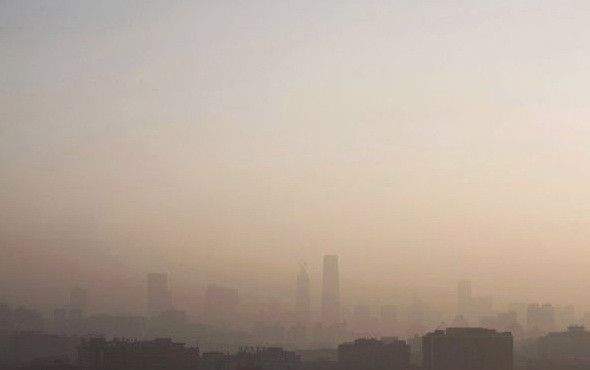 Bắc Kinh lần thứ hai ban bố báo động đỏ khói mù từ 19-22/12 ảnh 1