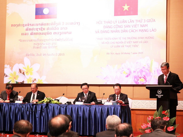 Hội thảo Lý luận giữa Đảng Cộng sản Việt Nam và Đảng NDCM Lào ảnh 1