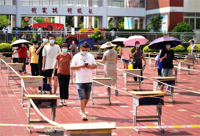 Xét nghiệm đại trà - Giải pháp dập dịch thần tốc của Trung Quốc ảnh 1