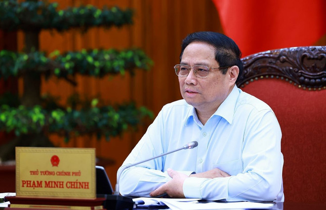 Thủ tướng Phạm Minh Chính chủ trì họp thúc đẩy tiến độ triển khai dự án đường dây 500kv mạch 3 và cung ứng điện tháng cao điểm. (Ảnh: Dương Giang/TTXVN) ttxvn_thu_tuong_hop_thuc_day_tien_do_trien_khai_du_an_duong_day_500kv_mach_3 _2505.jpg