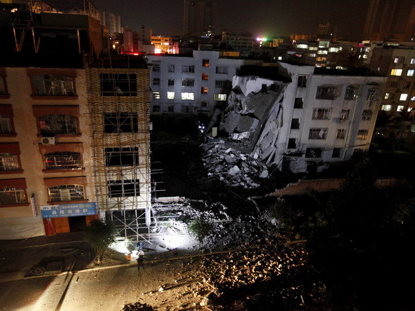 Nghi can thực hiện các vụ nổ tại Trung Quốc đã chết tại hiện trường ảnh 1