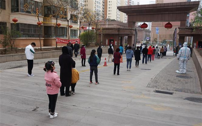 Dịch COVID-19 tiếp tục diễn biến phức tạp tại Trung Quốc ảnh 1