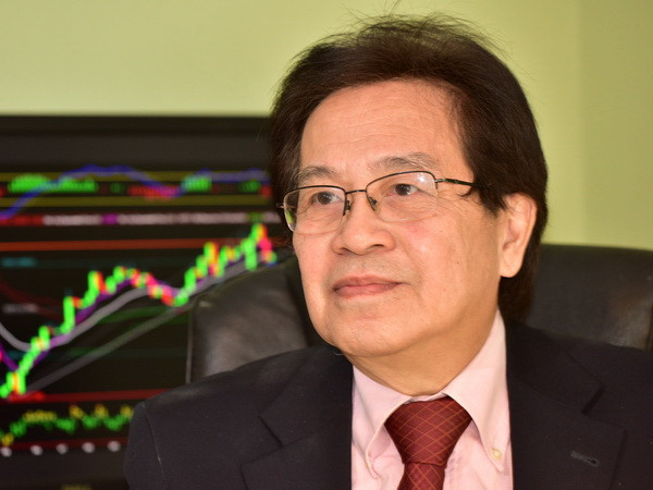 Chuyên gia tài chính Phạm Nam Kim. (Ảnh: Nguyễn Thái/Vietnam+) Thụy Sĩ sẵn sàng hỗ trợ Việt Nam xây Trung tâm tài chính quốc tế ảnh 1