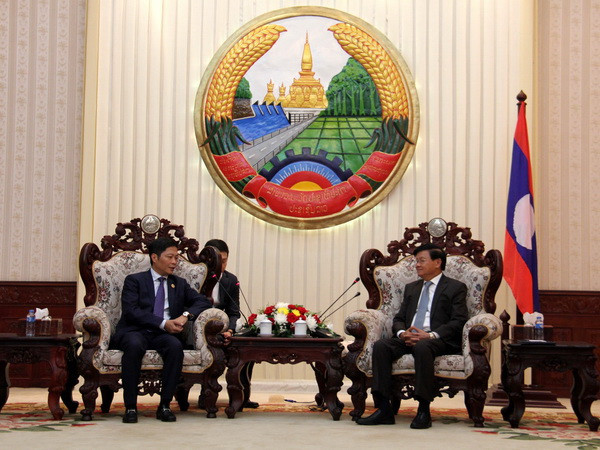 Thủ tướng Lào khuyến khích doanh nghiệp Việt Nam sang đầu tư ảnh 1