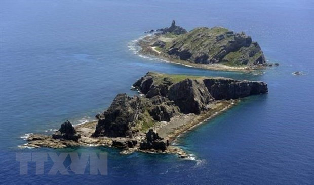 (Nguồn: AFP/TTXVN) Nhật Bản và Trung Quốc nhất trí duy trì liên lạc về vấn đề trên biển ảnh 1