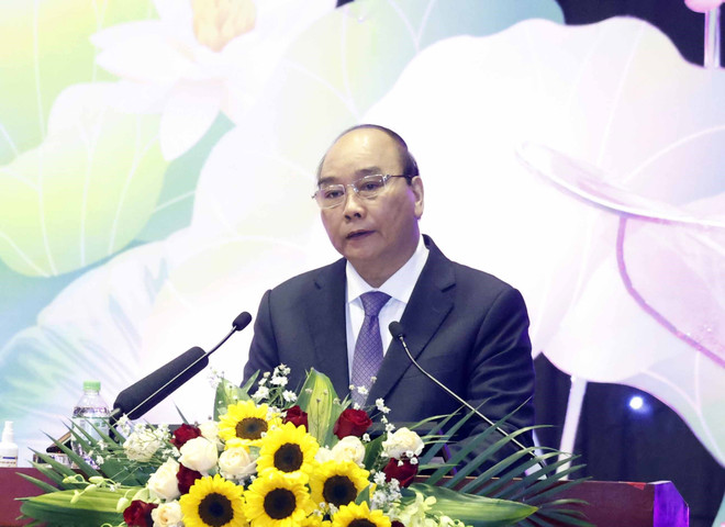 Chủ tịch nước Nguyễn Xuân Phúc phát biểu tại Đại hội. (Ảnh: Thống Nhất/TTXVN) Chủ tịch nước: Nâng cao hình ảnh, uy tín nghề nghiệp, địa vị luật sư ảnh 1