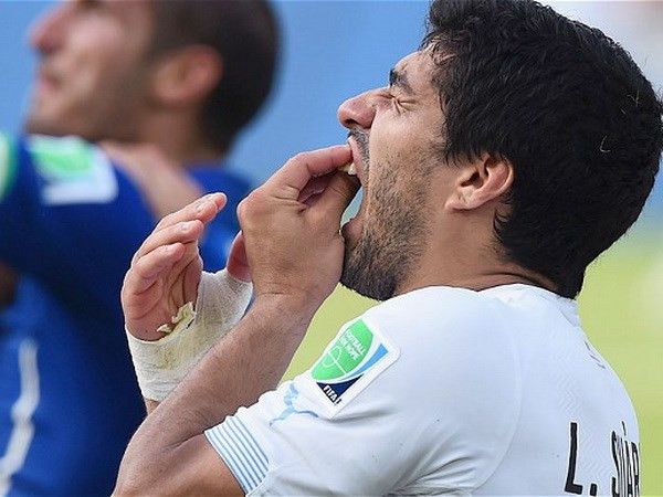 World Cup 2014: FIFA bác bỏ kháng án đối với Luis Suarez ảnh 1