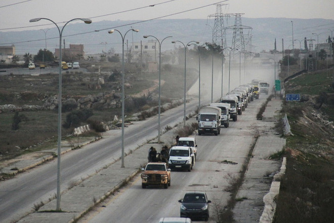 Đoàn xe chở hàng cứu trợ của LHQ tới ngoại ô Damascus ảnh 1