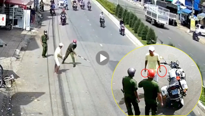 [Video] Đối tượng dùng vũ khí hung hăng chống đối công an ảnh 1