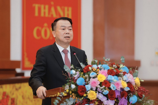 TTXVN_2810 Bo Tai chinh Thu truong Nguyen Duc Chi.jpeg