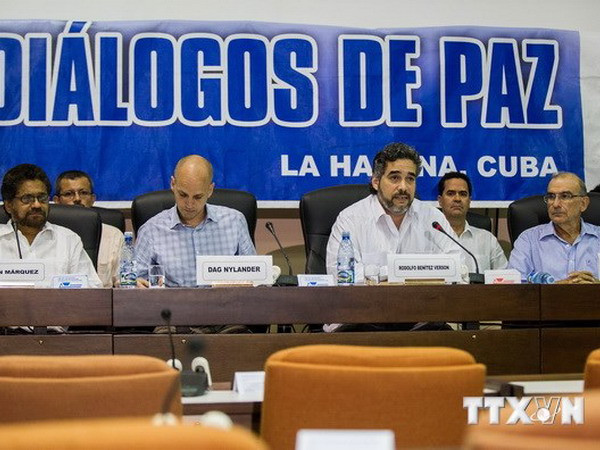 Chính phủ Colombia và nhóm FARC nhất trí nối lại đàm phán ảnh 1