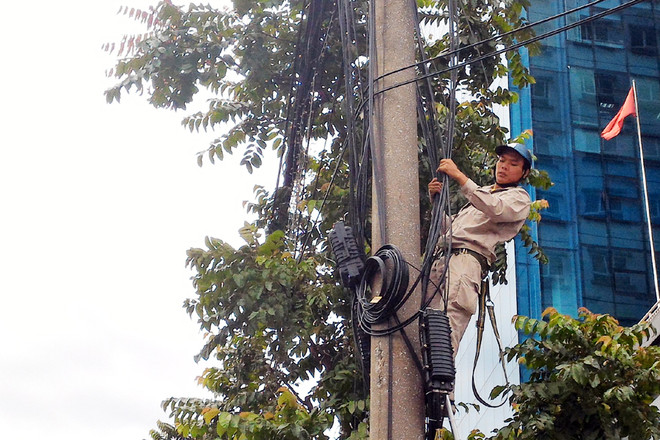 “Trảm” hàng triệu mét dây cáp thừa trên cột điện, cột chiếu sáng ảnh 1