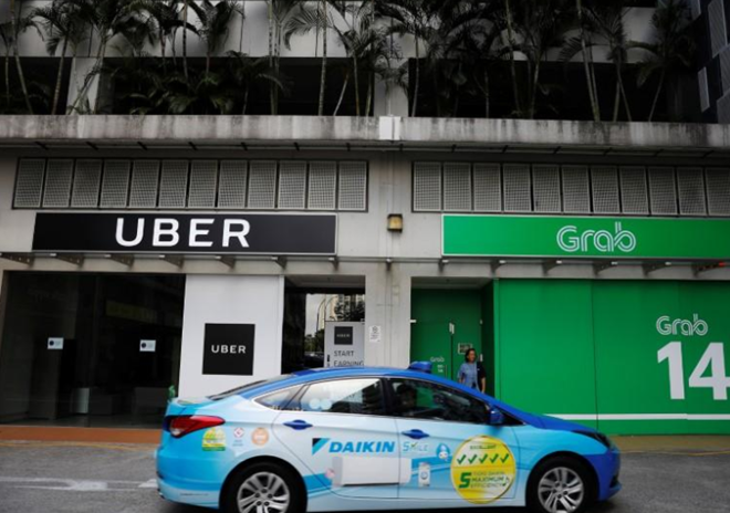 Grab ‘mua đứt’ Uber liệu có phải nộp khoản thuế 53,3 tỷ đồng? ảnh 1
