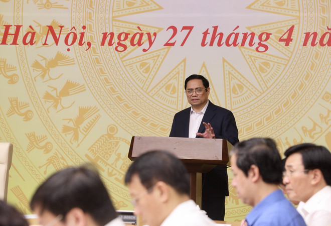 Thủ tướng Phạm Minh Chính, Chủ tịch Ủy ban chủ trì phiên họp thứ hai của Ủy ban Quốc gia về chuyển đổi số nhằm đánh giá tình hình triển khai công tác chuyển đổi số quý I. (Ảnh: Lâm Khánh/TTXVN) Thủ tướng: Chống hình thức, phô trương trong tiến trình chuyển đổi số ảnh 2