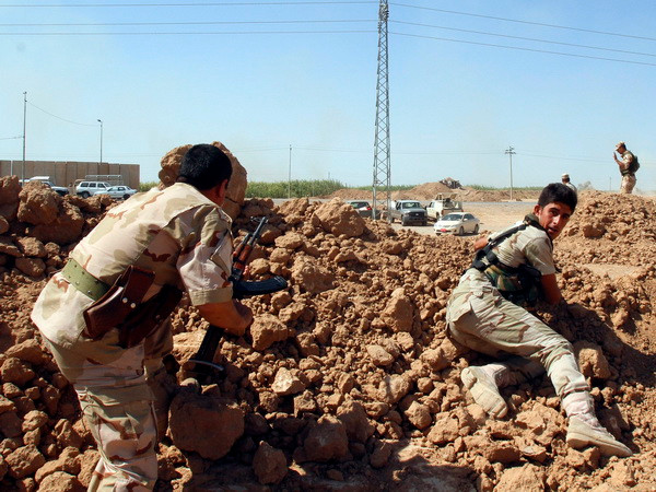 Thổ Nhĩ Kỳ cho phép người Kurd qua lãnh thổ để bảo vệ Kobane ảnh 1