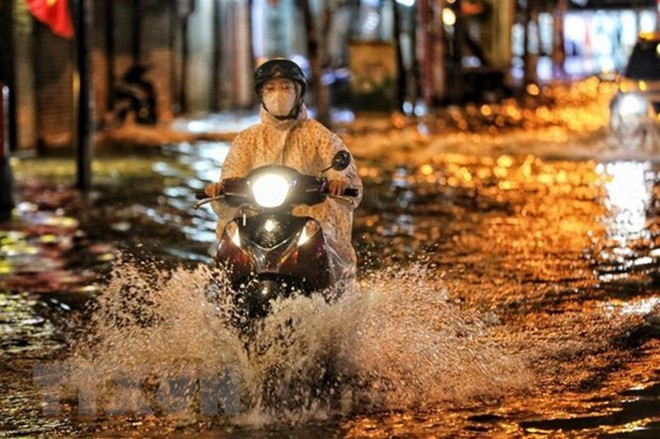 (Ảnh minh họa: Thành Đạt/TTXVN) Chuyên gia khí tượng: Sáng 13/6, Hà Nội tiếp tục có mưa lớn kéo dài ảnh 1