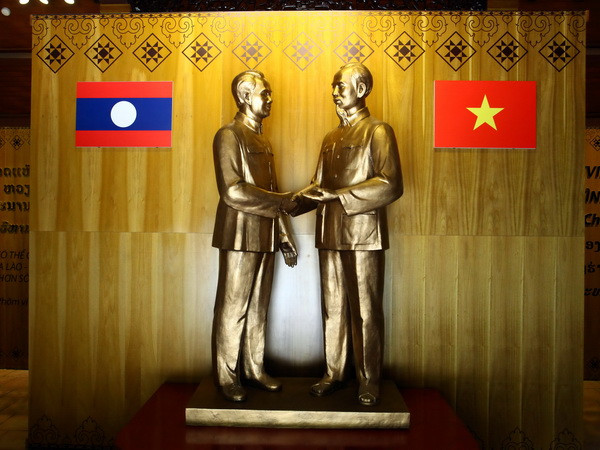 Điện mừng nhân kỷ niệm 55 năm Ngày thiết lập quan hệ Việt-Lào ảnh 1