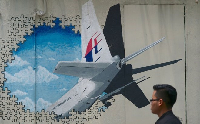 (Nguồn: AFP/Getty) Máy bay MH370 không nằm trong khu vực tìm kiếm hiện nay ảnh 1