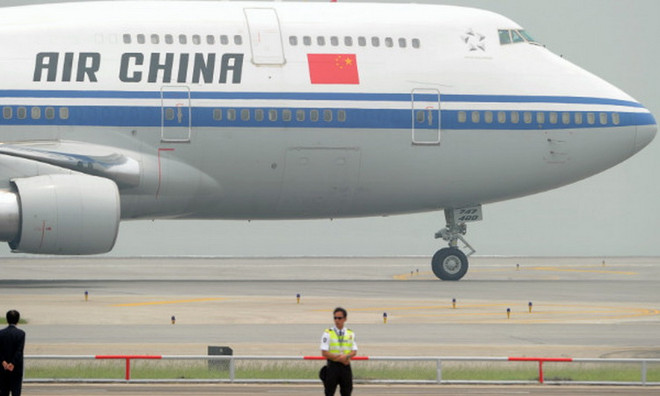 Máy bay Trung Quốc phải hạ cánh khẩn cấp do cảnh báo có bom ảnh 1