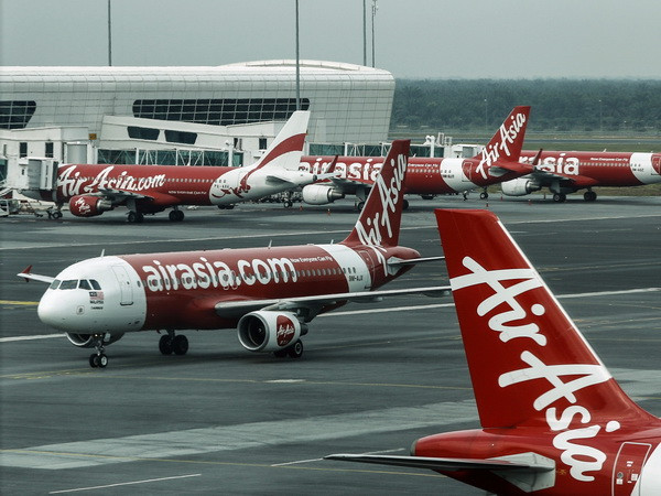 Xạ thủ Hoàng Xuân Vinh được bay AirAsia miễn phí trọn đời ảnh 1