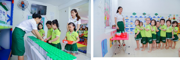 Các cô giáo cẩn thận và tỉ mỉ ngay từ khâu sắp xếp, bảo quản và dạy các con thói quen nề nếp, kỉ luật khi chuyển, phát sữa đến các lớp học Không chỉ dạy chữ, thầy cô còn là các 'chuyên gia' dinh dưỡng ảnh 3