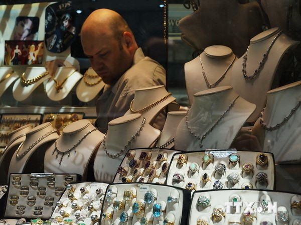 Giá vàng ở Mỹ rời khỏi mức cao nhất trong 3 tuần qua ảnh 1