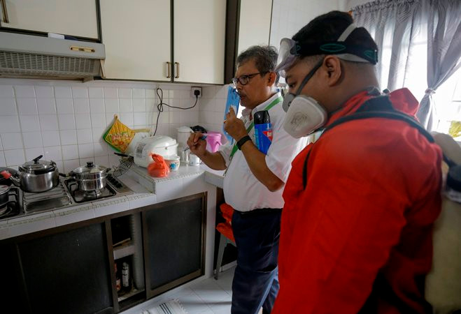 Singapore xem xét lại việc cách ly bệnh nhân nghi nhiễm Zika ảnh 1