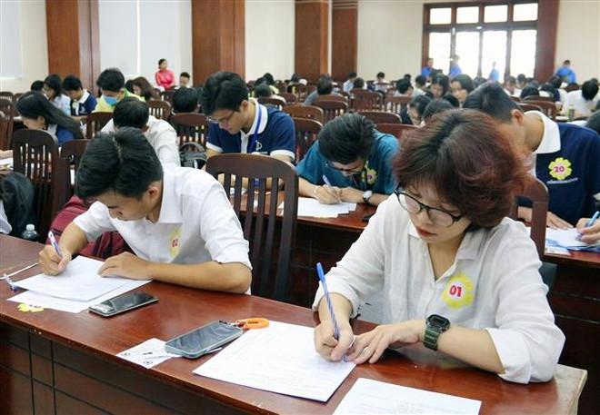 Thí sinh dự thi hướng dẫn viên du lịch giỏi Thành phố Hồ Chí Minh mở rộng năm 2022. (Ảnh: Thanh Vũ/TTXVN) Xây dựng hệ sinh thái du lịch phát triển bền vững tại TP.HCM ảnh 2