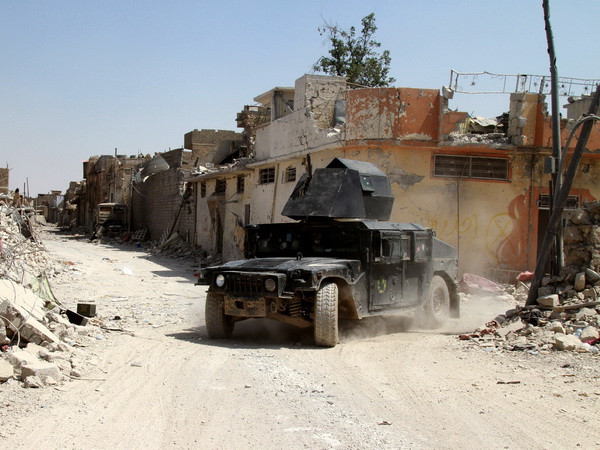 Tổ chức Ân xá Quốc tế kêu gọi lập ủy ban điều tra tội ác tại Mosul ảnh 1