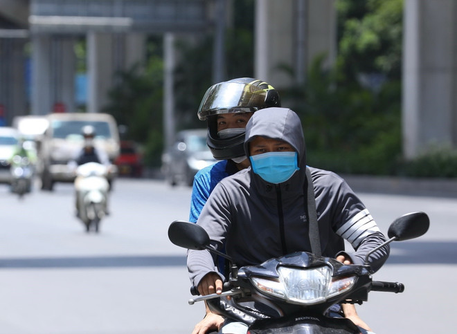 Bắc Bộ nắng nóng, có nơi nhiệt độ trên 37 độ C. (Ảnh: Hoàng Hiếu/TTXVN) Khu vực Bắc Bộ tiếp tục nắng nóng, nhiệt độ cao nhất trên 37 độ C ảnh 1