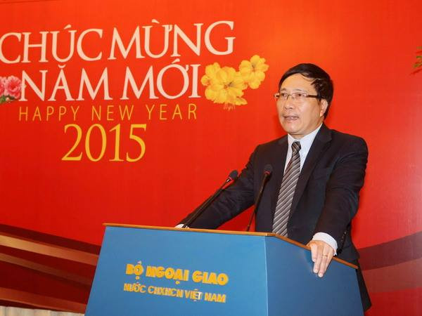 Phó Thủ tướng Phạm Bình Minh gặp gỡ báo chí dịp năm mới 2015 ảnh 1